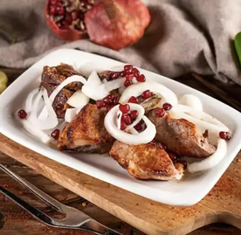Pork Barbecue at Tbilisuri Ezo in Tbilisi }}