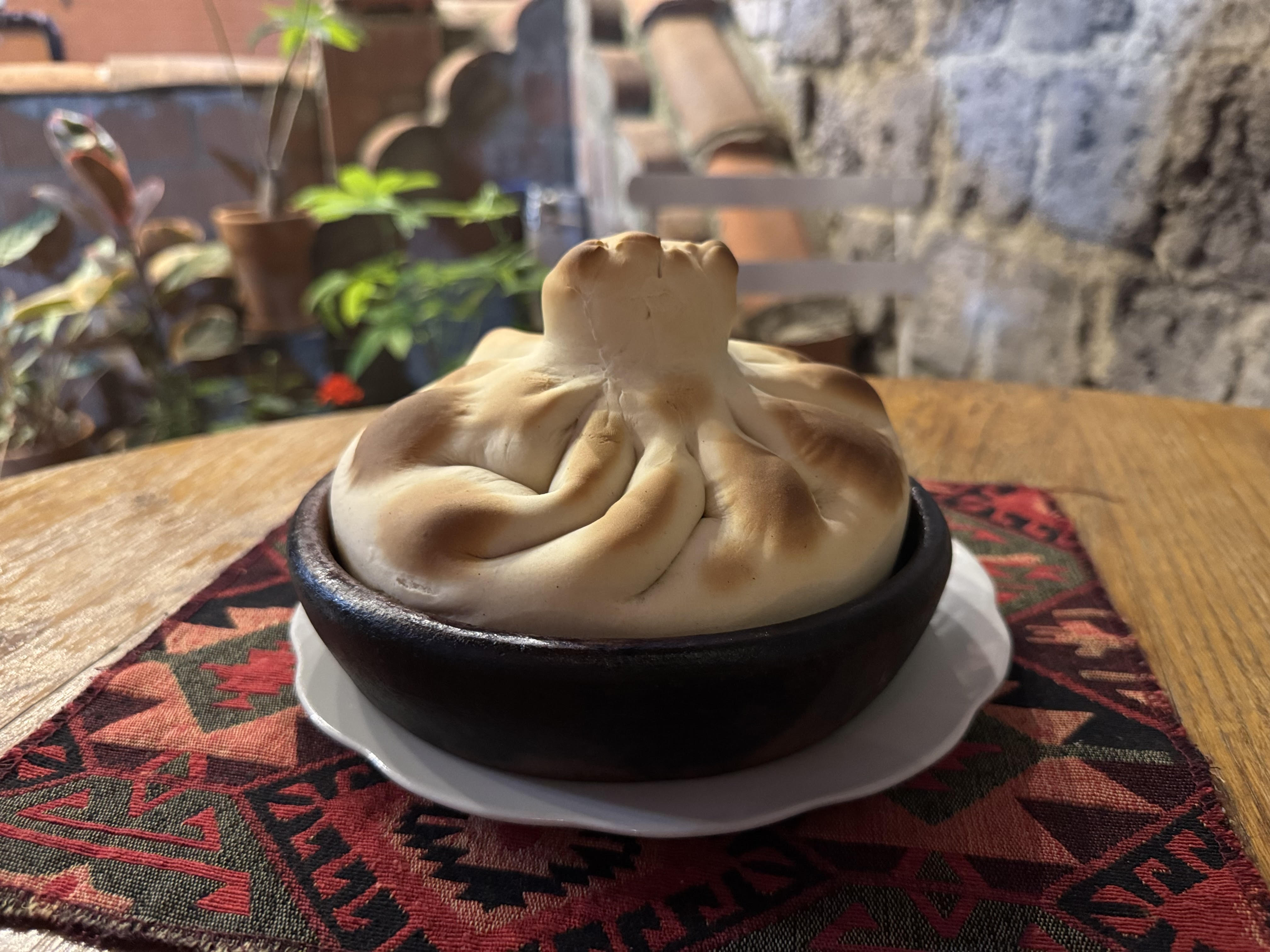 Фирменные Чашушули в хинкали на Кеци at Tbilisuri Ezo Georgian restaurant in Tbilisi }}