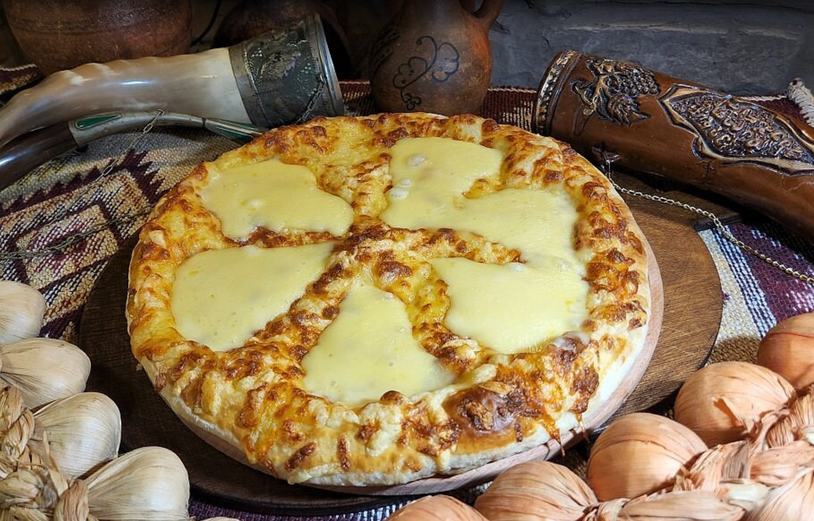 Royal Khachapuri at Tbilisuri Ezo Georgian restaurant in Tbilisi }}