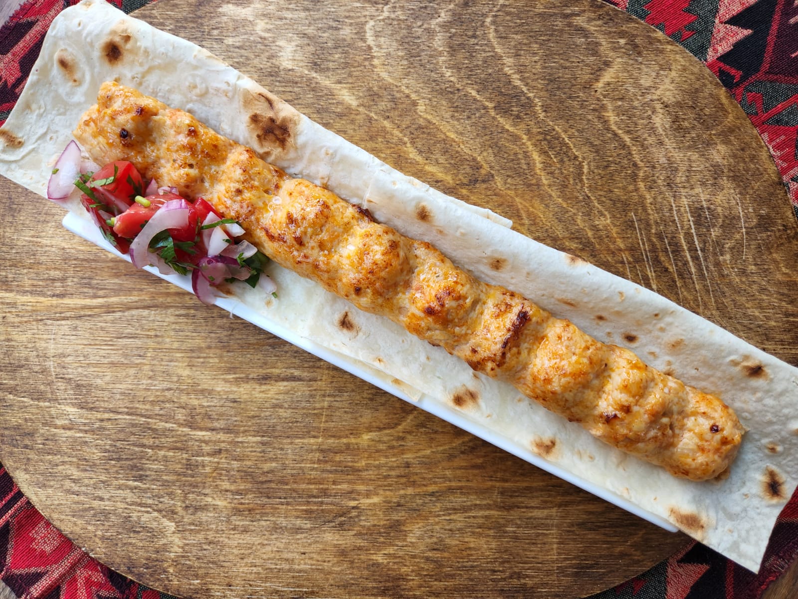 Kebab with chicken meat at Tbilisuri Ezo Georgian restaurant in Tbilisi }}
